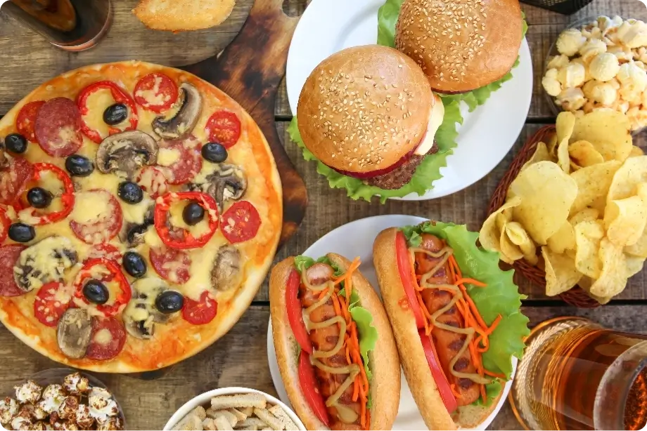 fast food old on wooden table top view